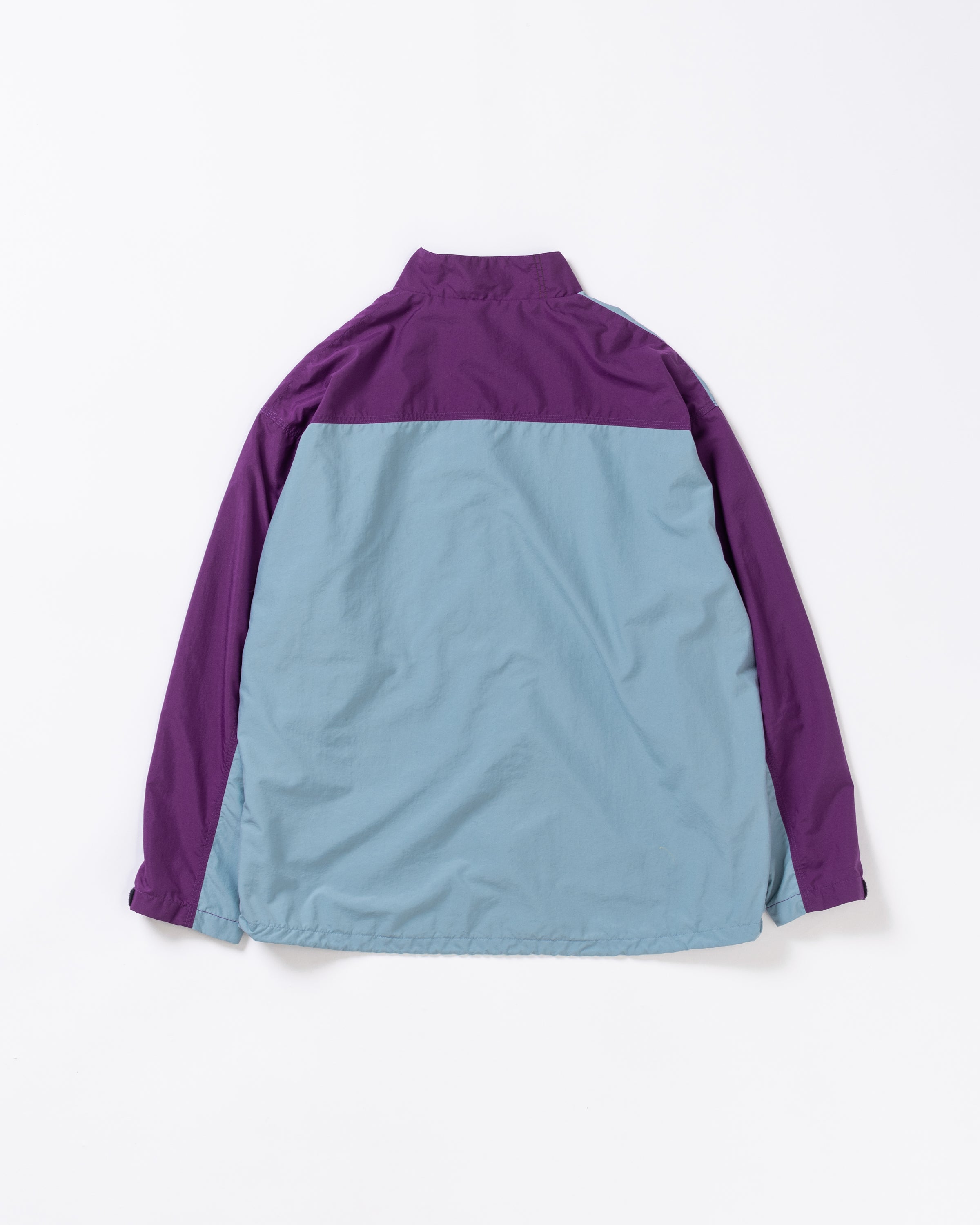 ANACHRONORM / EXCHANGE PATTERN NYLON JACKET - SKY BLUE×PURPLE