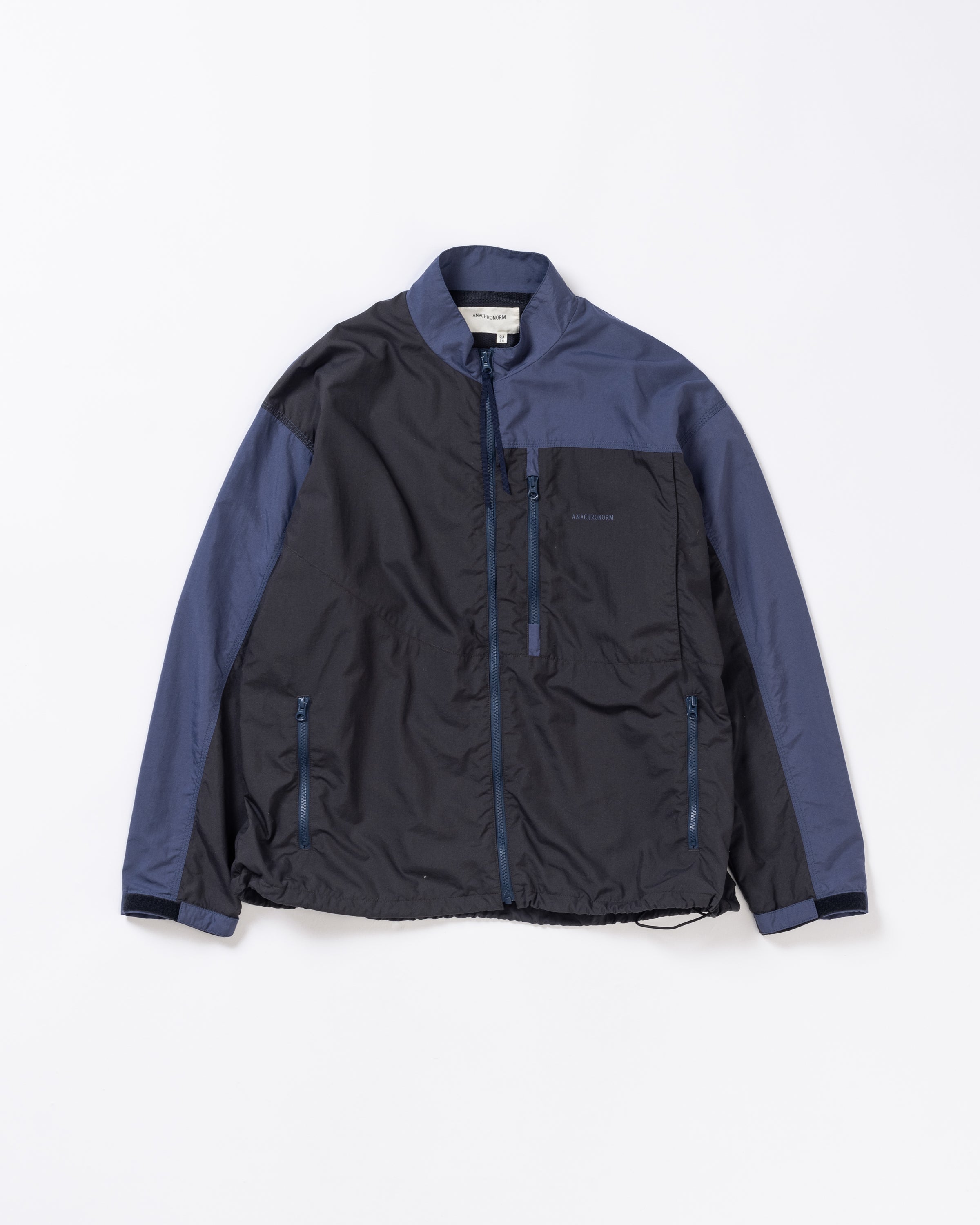 ANACHRONORM / EXCHANGE PATTERN NYLON JACKET - NAVY×BLACK