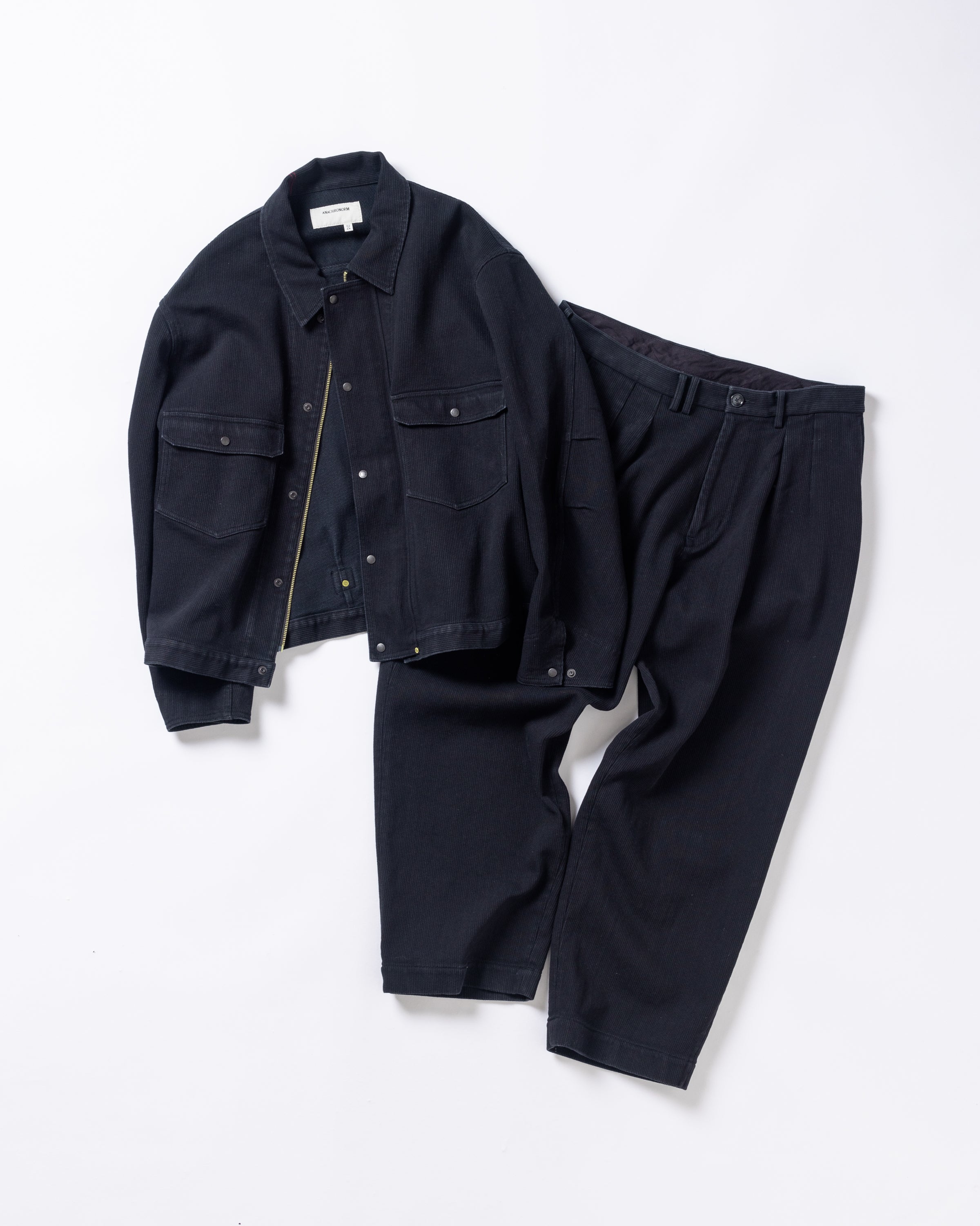 ANACHRONORM / HEAVY PIQUE 2 TUCK WIDE TROUSERS BLACK