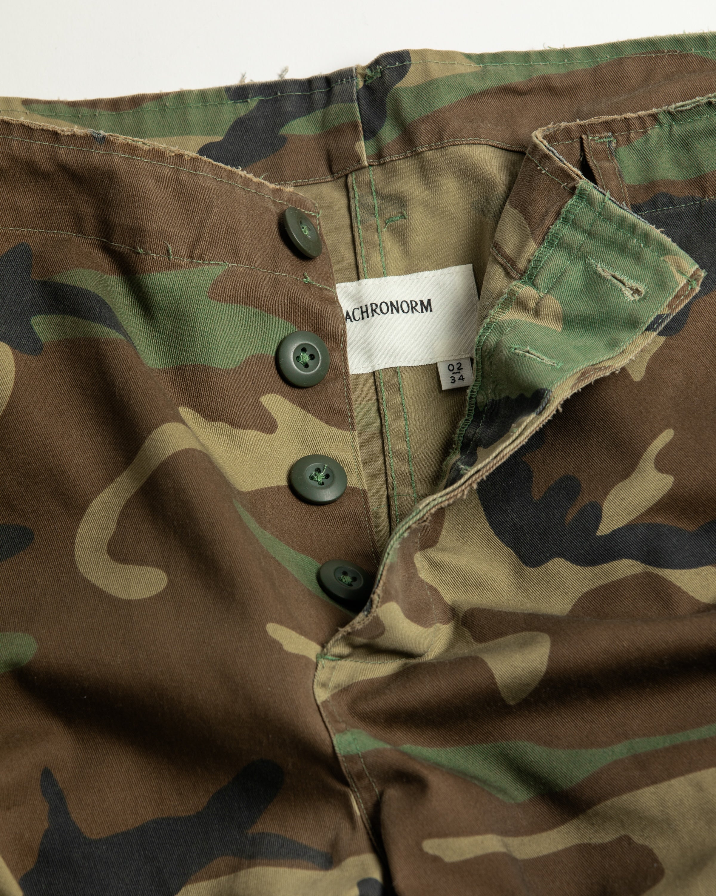 ANACHRONORM / CUT-OFF HARD DAMAGED B.D.U CAMO PANTS - WOODLAND