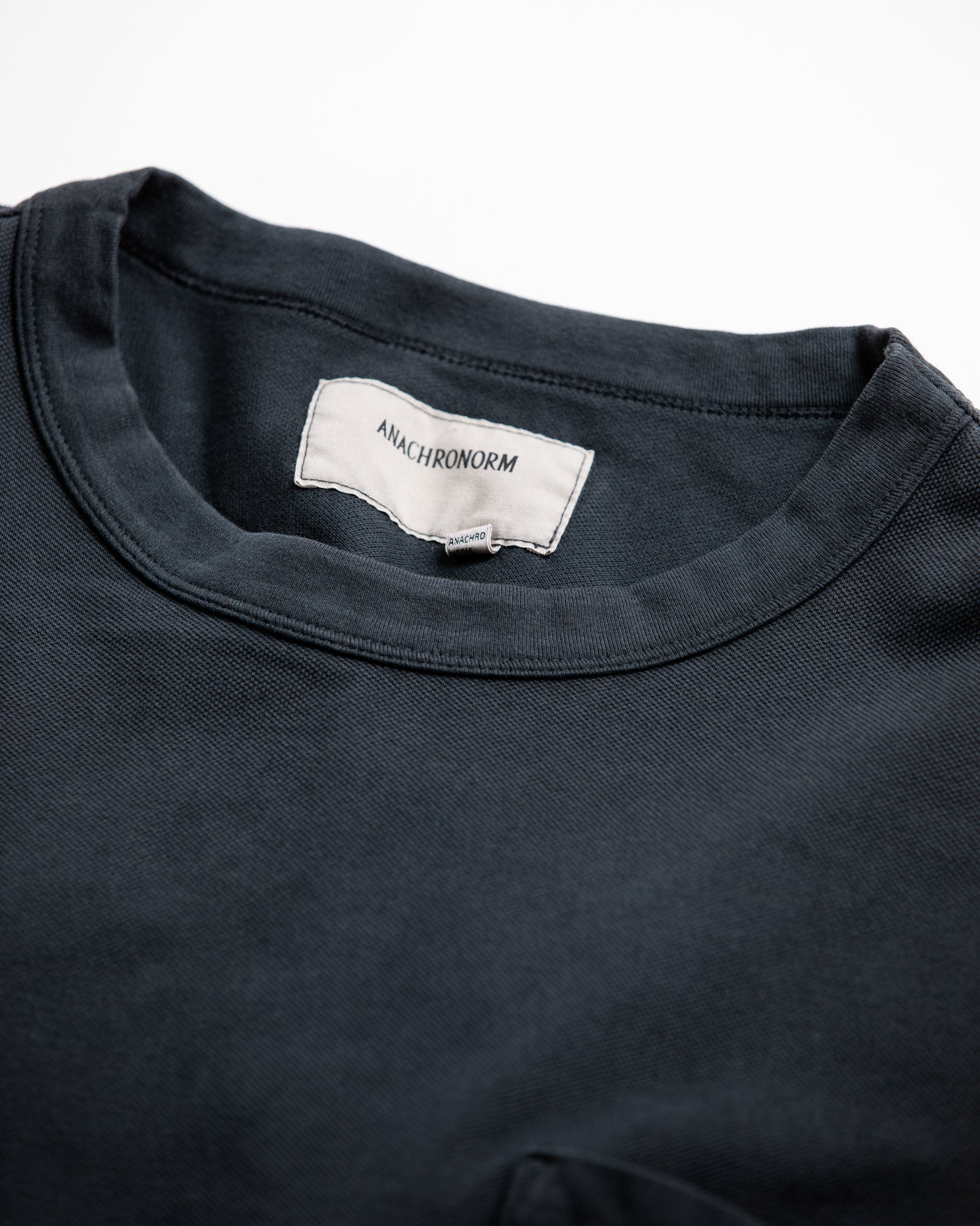 ANACHRONORM / MOSS STITCH DAMAGED POCKET S/S T-S - BLACK