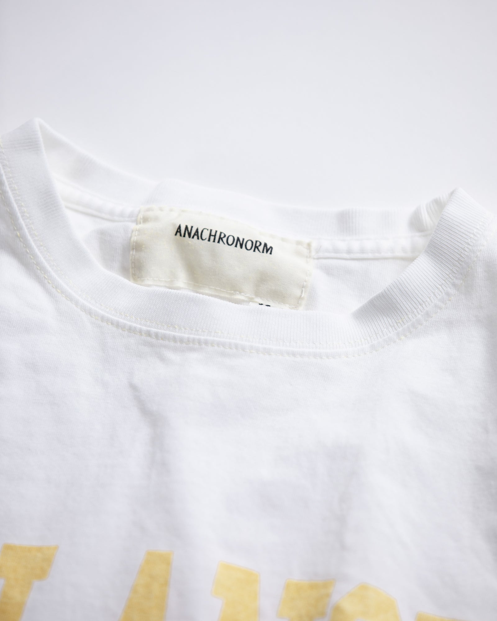 ANACHRONORM / BALANCE COLLEGE PRONTED S/S T-S - YELLOW PRINT
