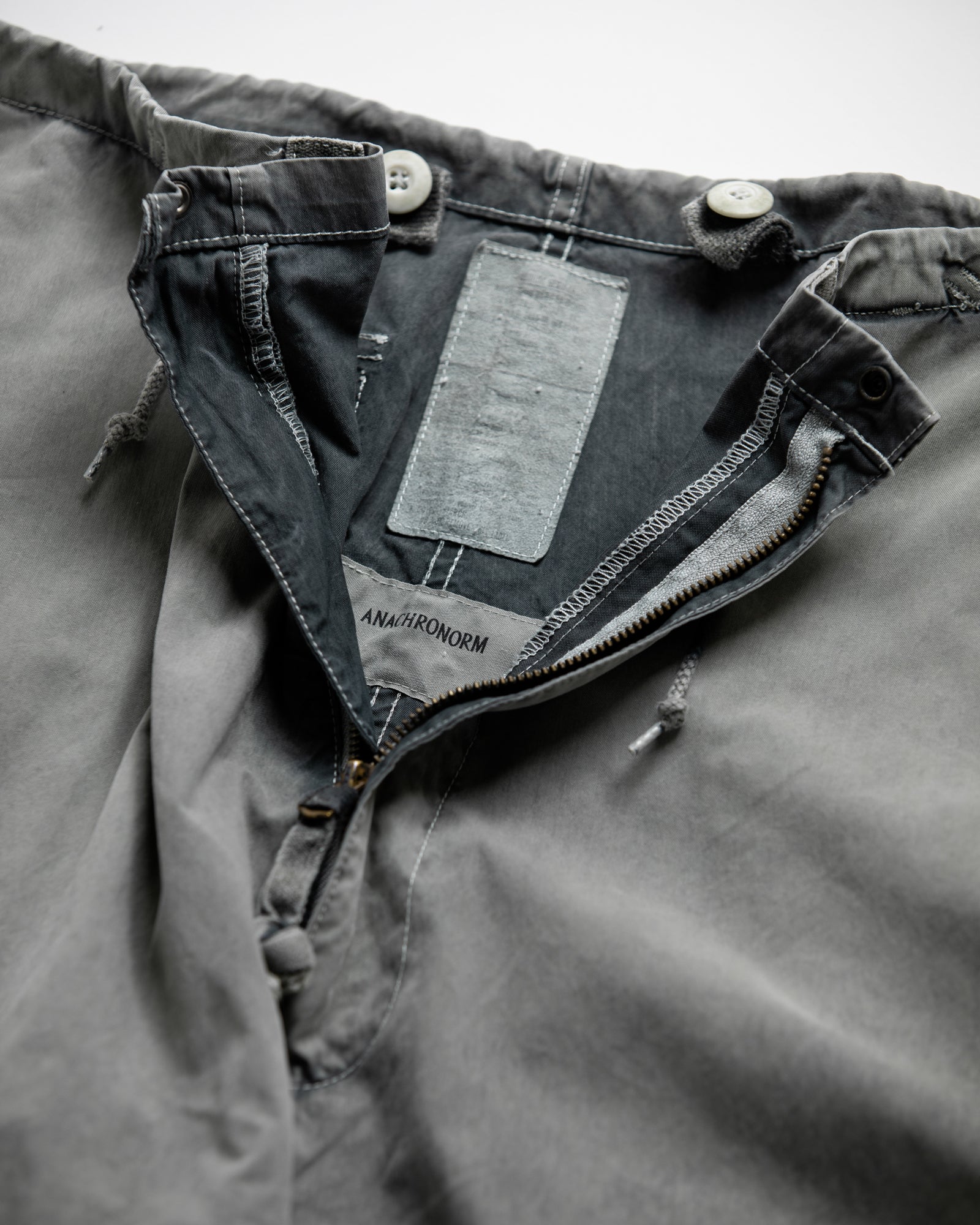 ANACHRONORM / SULFUR DYED SNOW CAMO ARCTIC PANTS - FADE OLIVE
