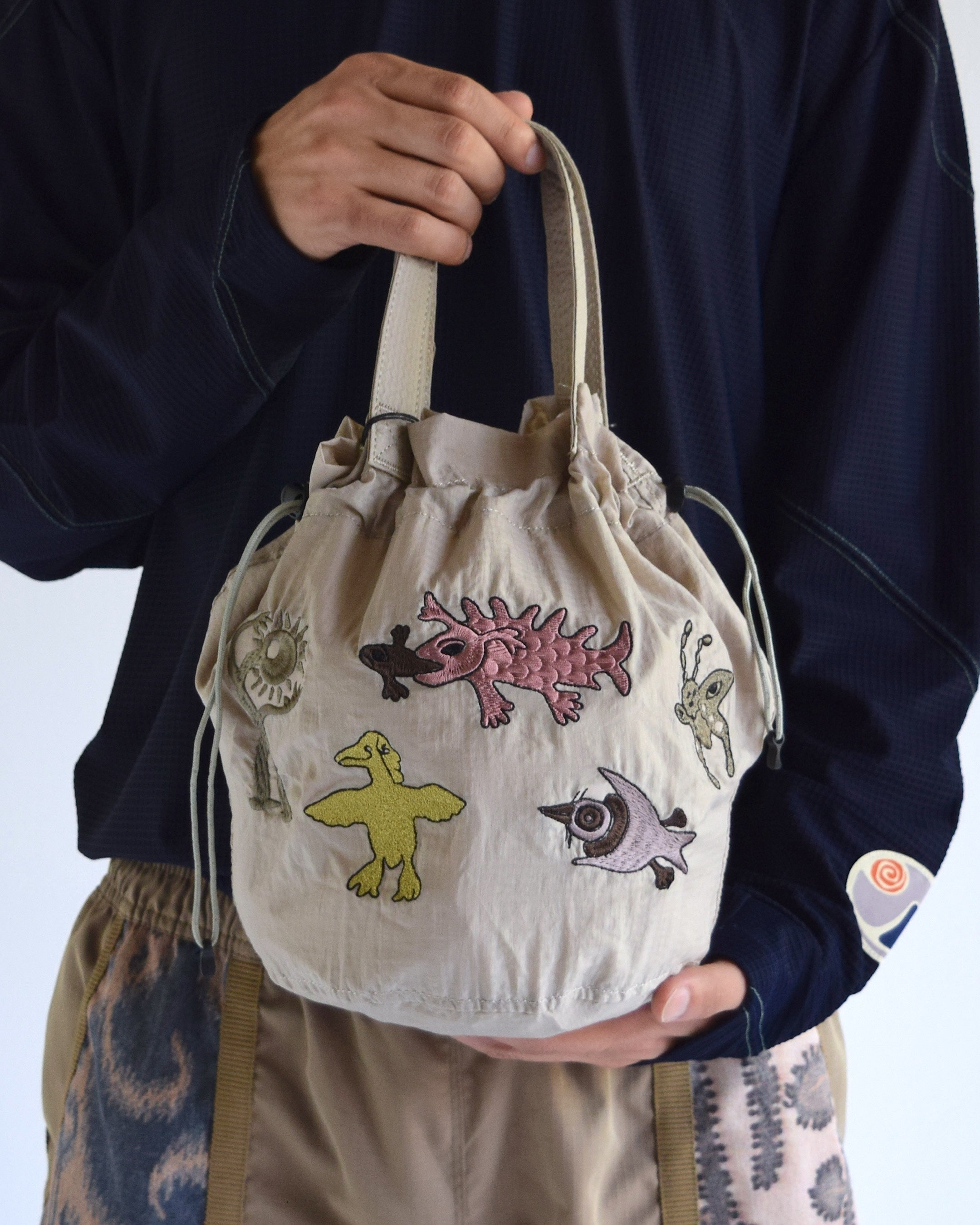 Somewhere Outside / Drawstring Tote Bag - BEIGE