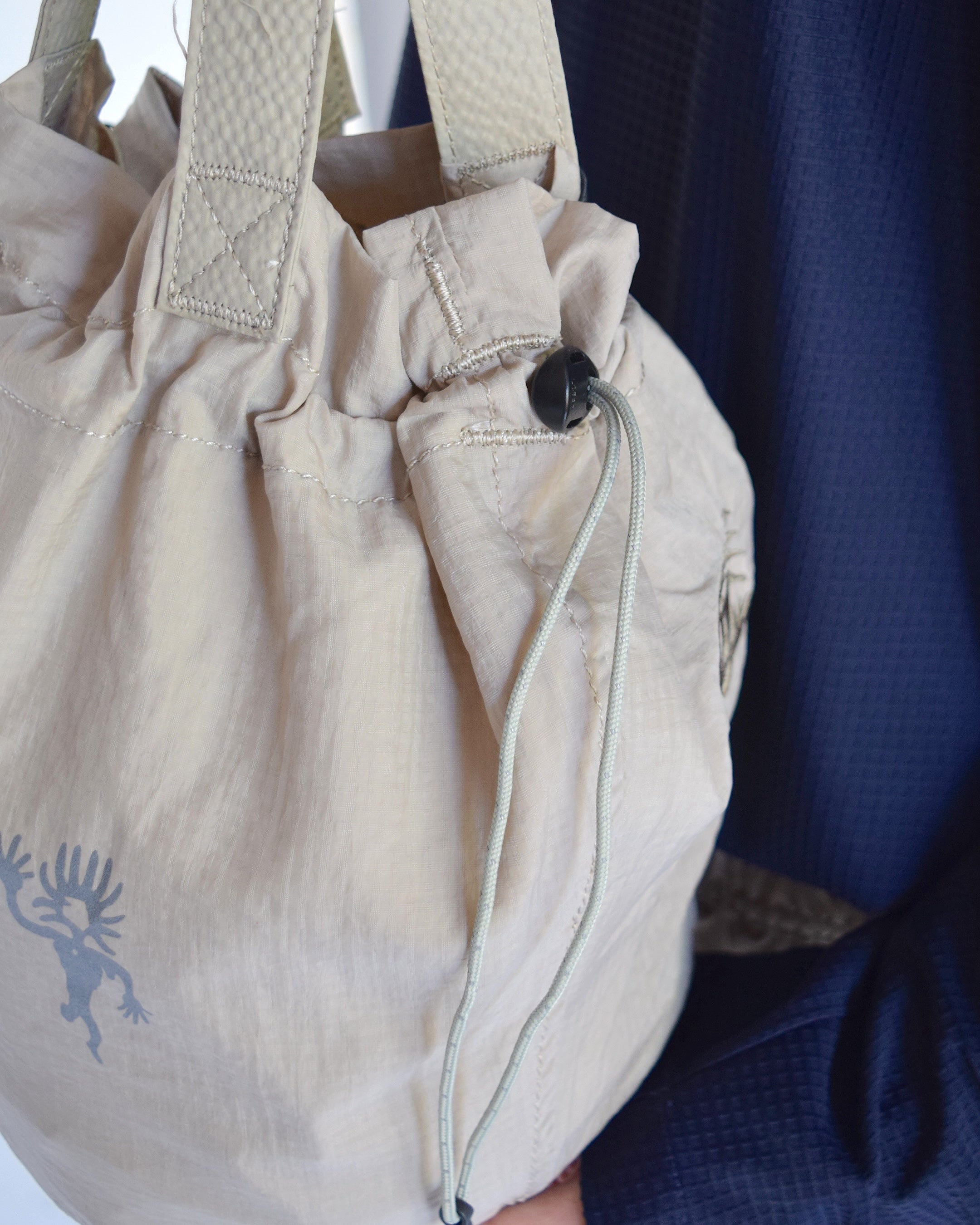 Somewhere Outside / Drawstring Tote Bag - BEIGE