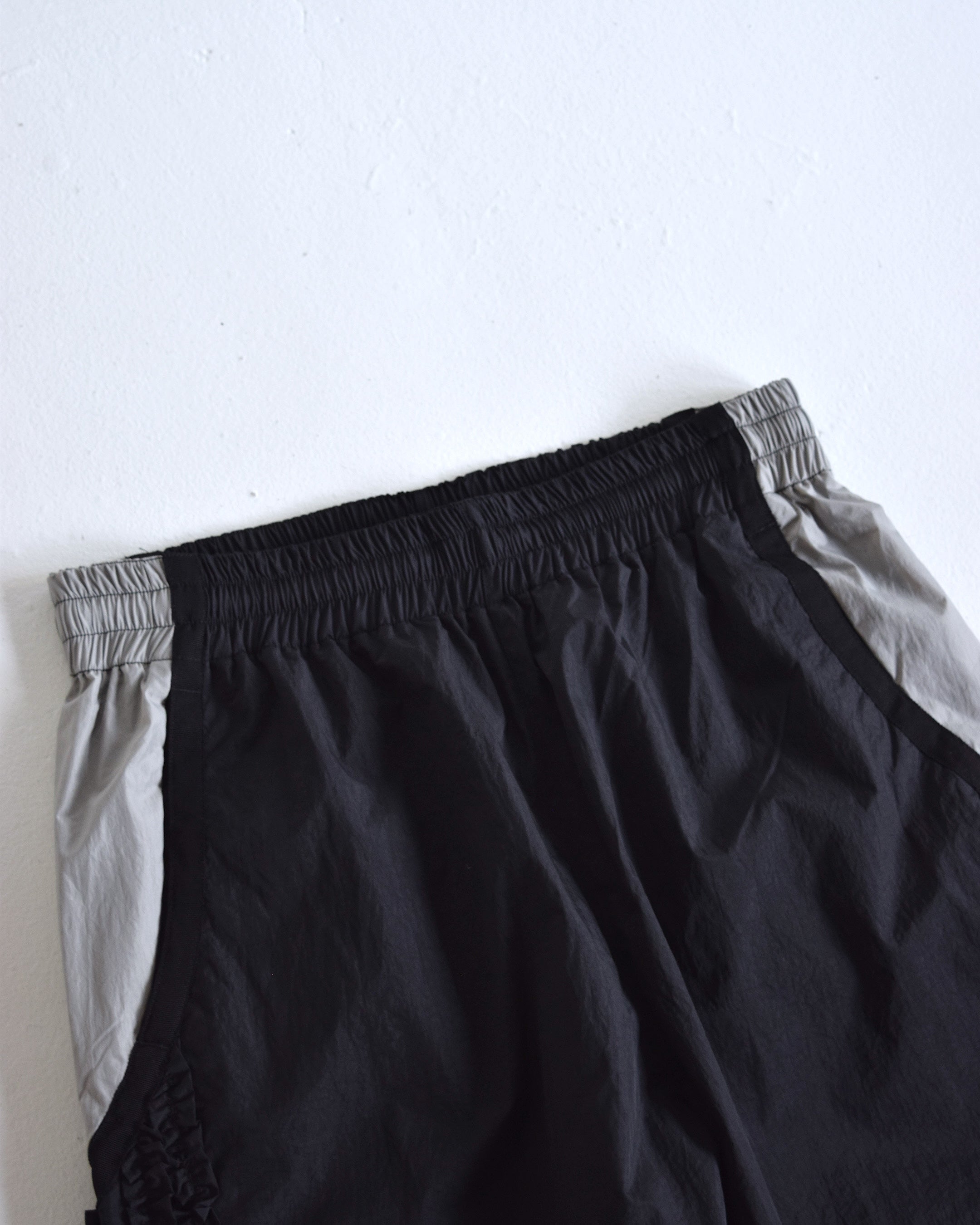 NICK GEAR / Nylon Ruffle pants - BLACK